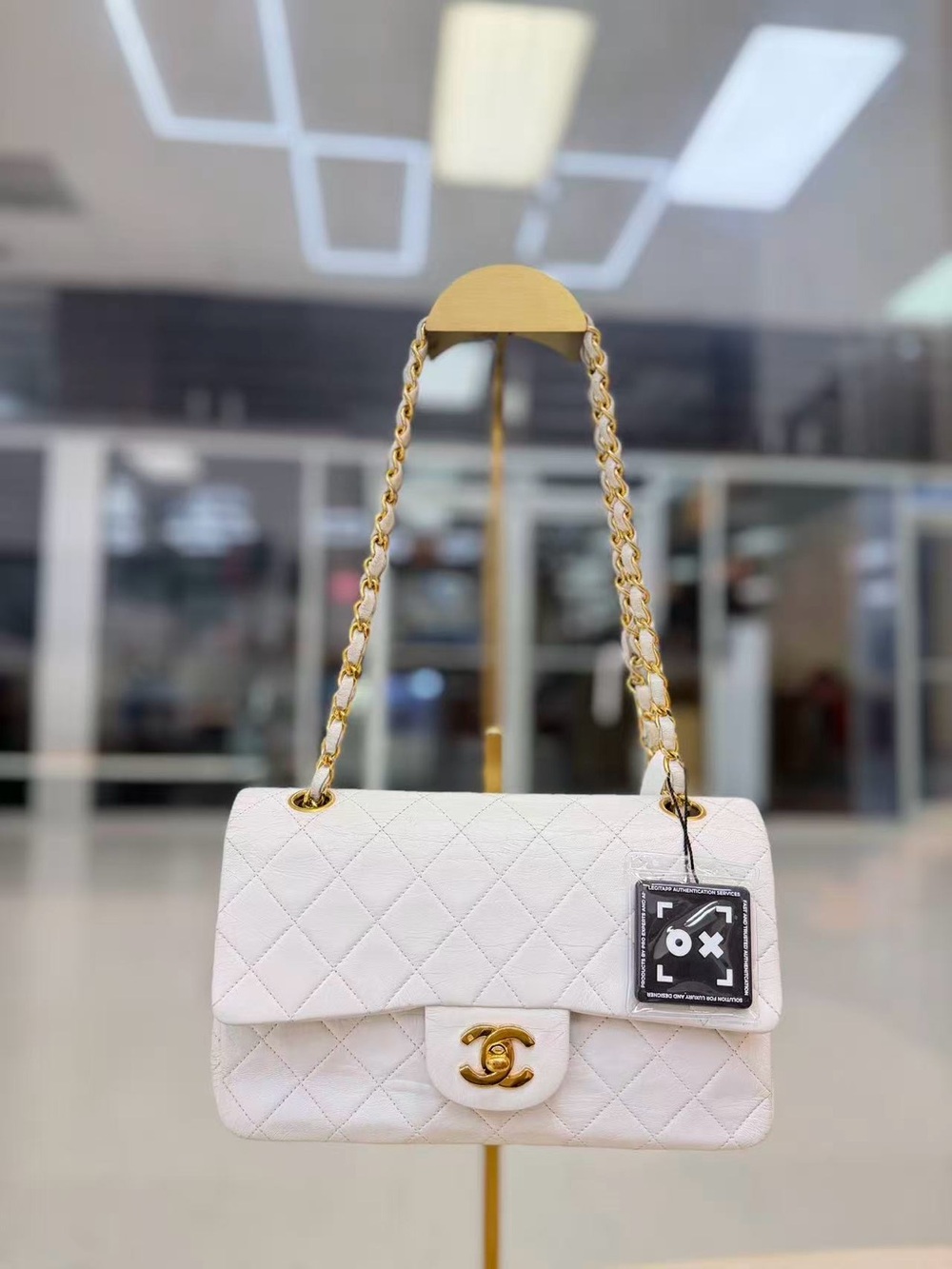 Vintage CHANEL White Quilted Leather Shoulder Bag with Gold Chain and CC Lock